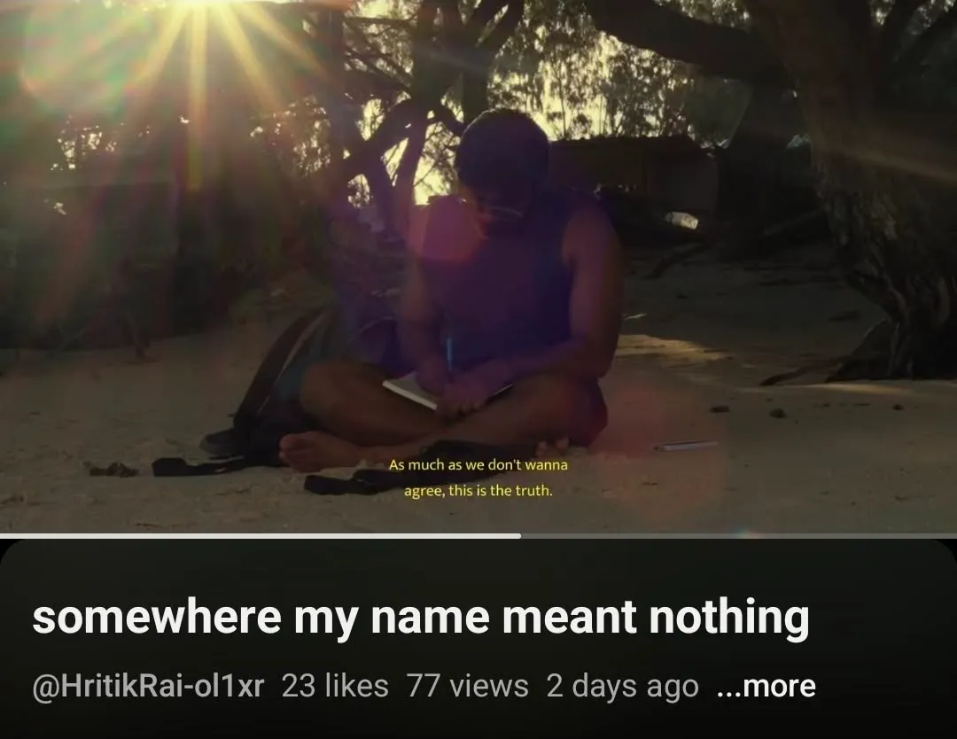 a person sitting on the ground with a book